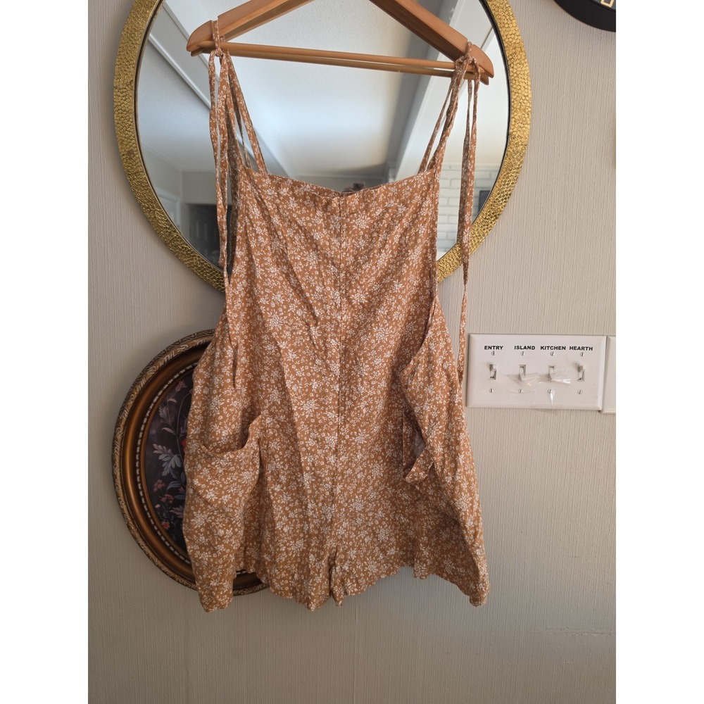Mustard colored floral print short romper with tie shoulder straps plus size 1x